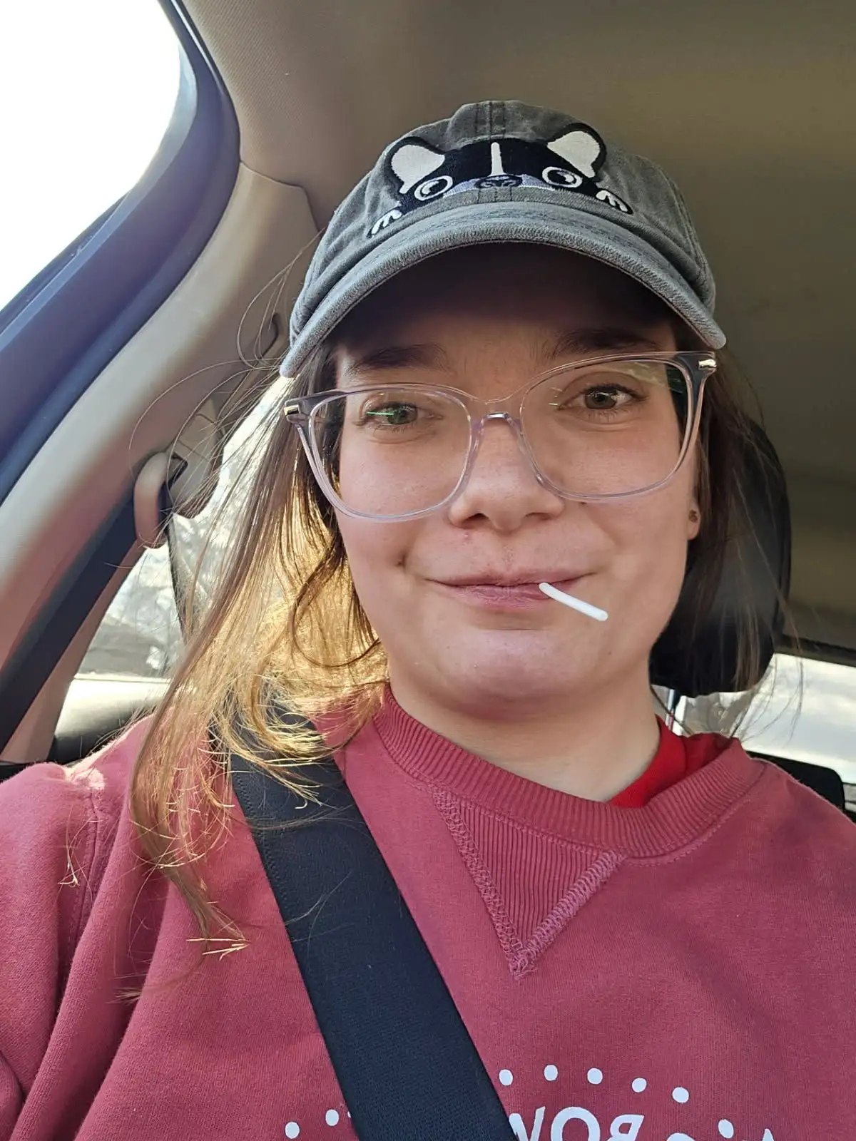 Macy in her car